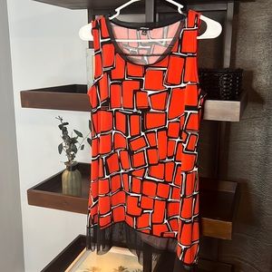 Never worn cute dressy top! The tag was taken off but never worn!